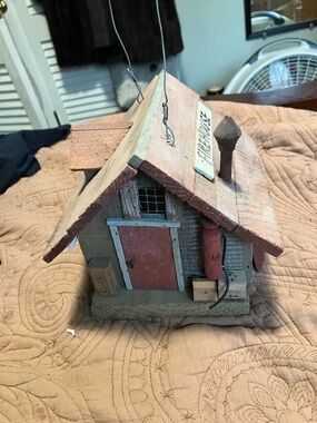 Rustic Wooden Birdhouse Designed to Look Like a vintage firehouse